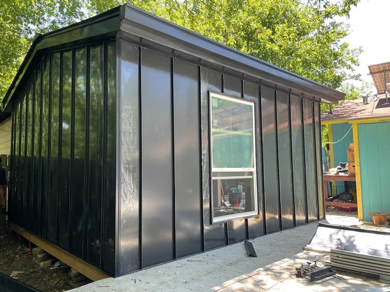 Black standing seam metal wall panels for Metal Roof Installation in Marblehead