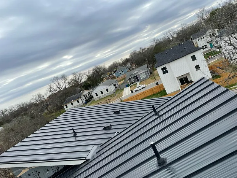 Standing seam metal roof panels with vents for Skylight Repair in Marblehead